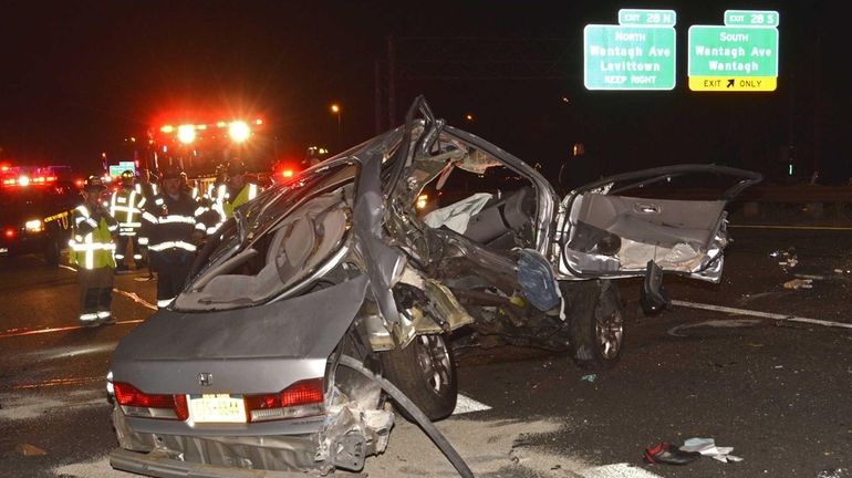 Emergency responders at the scene of a multivehicle crash on...