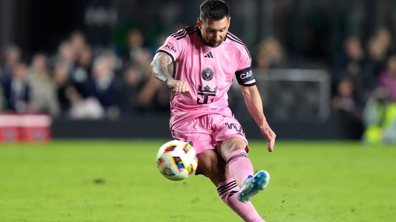 Inter Miami forward Lionel Messi takes a free kick during...