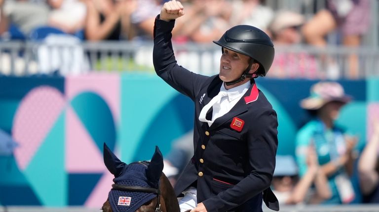 Britain's Tom Mcewen, riding JL Dublin gestures, during the equestrian...