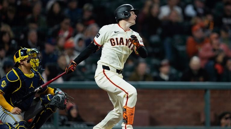 San Francisco Giants' Mike Yastrzemski watches his RBI double during...