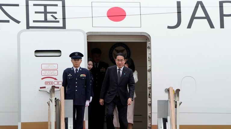 Japanese Prime Minister Fumio Kishida arrives at Seoul air base...