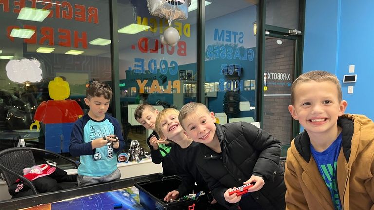 A group of children attend a class at X-Robotx, new...