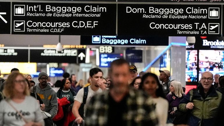 Travelers move through the B terminal at Hartsfield-Jackson Atlanta International...