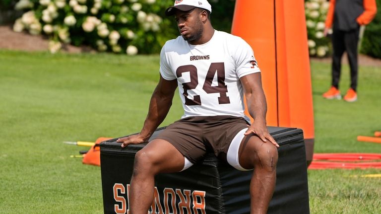 Cleveland Browns running back Nick Chubb (24) takes a break...