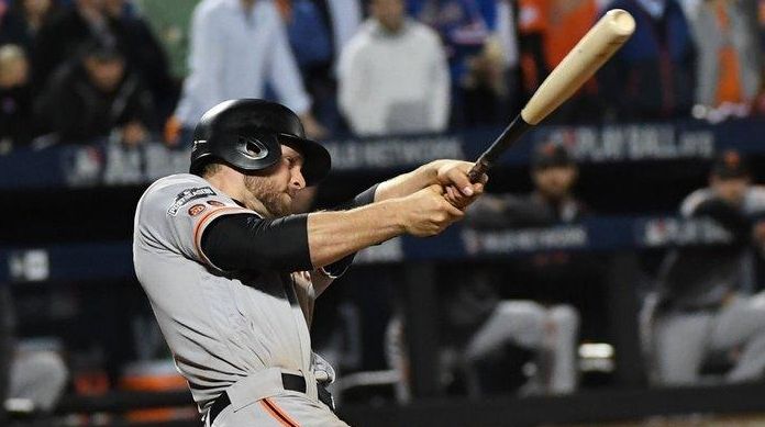 San Francisco Giants third baseman Conor Gillaspie hits a three-run...