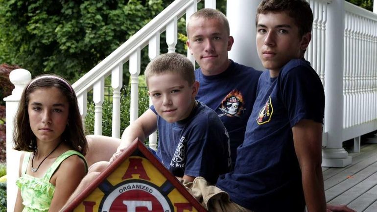 From left, Kelsey, 13, Sean, 9, Andrew Jr., 19, and...