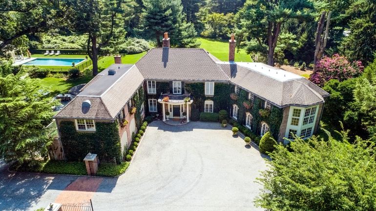 This Laurel Hollow estate is on the market for $3.495...