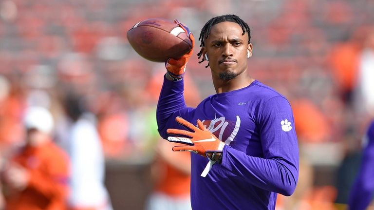 Clemson's Diondre Overton runs drills during warmups before an NCAA...