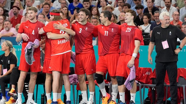 Denmark players celebrate after a goal during the gold medal...