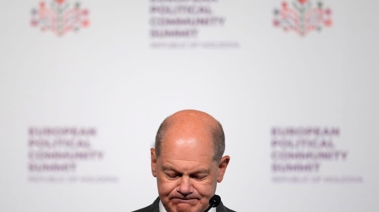 Germany's Chancellor Olaf Scholz addresses a media conference during the...