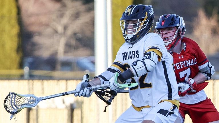 Owen Duffy of St. Anthony's slips the ball into the short...