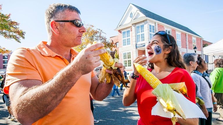 Steve Breest, of Flanders, and his daughter, Ariana Breest, eat...