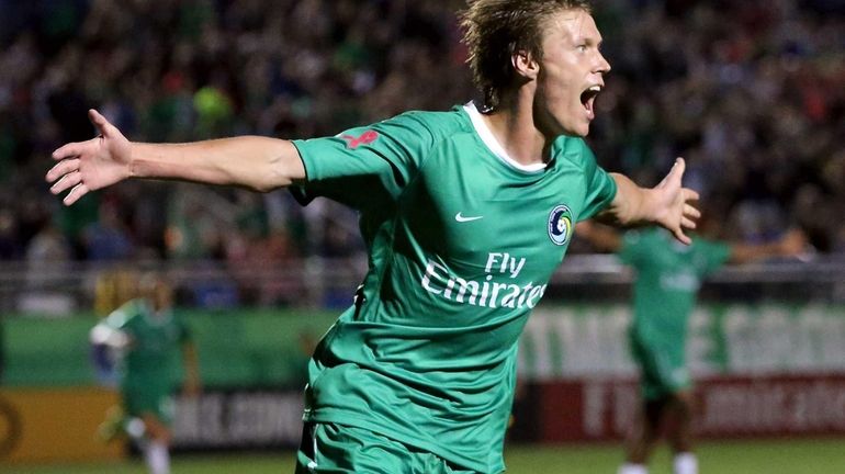 The Cosmos' Mads Stokkelien celebrates his second goal against the...