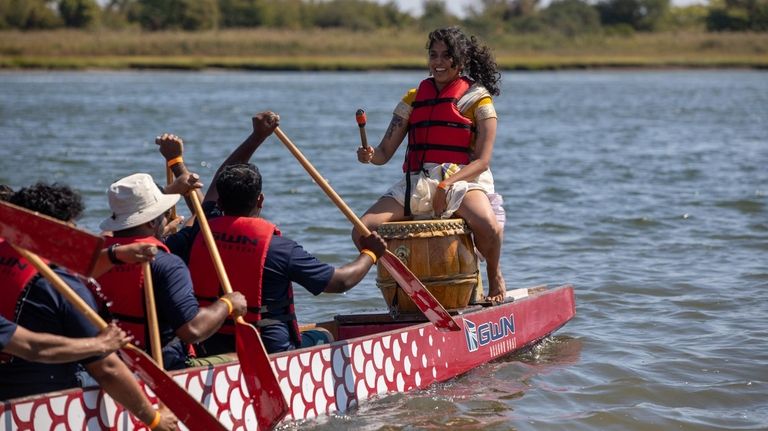 Anupama Raghunathan from Brooklyn plays the drum as the Asian...