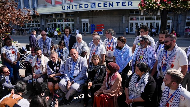 Uncommitted delegates hold a press conference outside the United Center...