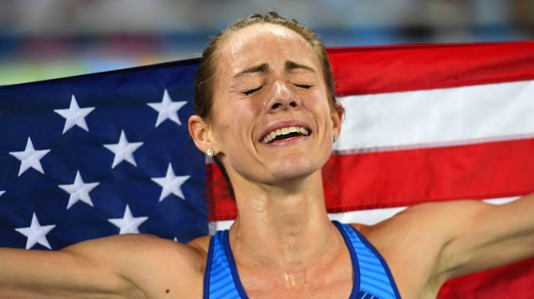 Bronze medallist USA's Jennifer Simpson celebrates after the Women's 1500m...