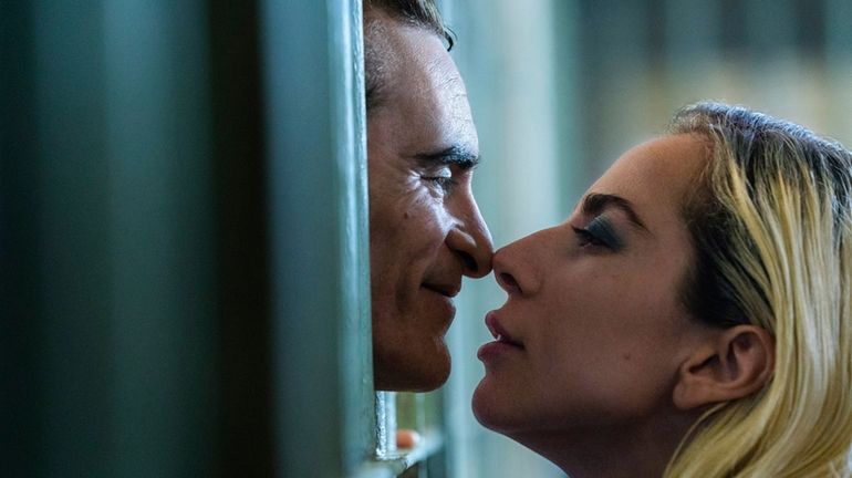 This image released by Warner Bros. Pictures shows Joaquin Phoenix,...