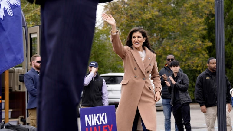Republican presidential candidate former UN Ambassador Nikki Haley walks to...