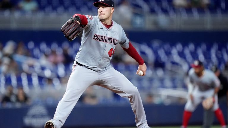 Washington Nationals' Patrick Corbin delivers a pitch during the first...