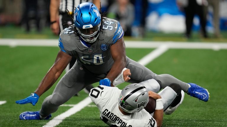 Detroit Lions defensive tackle Alim McNeill (54) sacks Las Vegas...