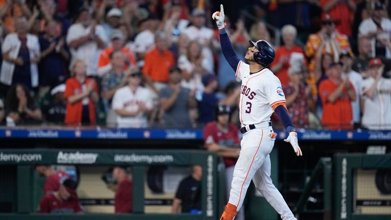 Houston Astros' Jeremy Pena celebrates his three-run home run against...