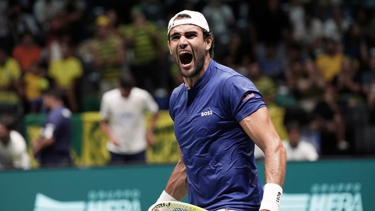 Matteo Berrettini, of Italy, celebrates defeating Joao Fonseca, of Brazil,...