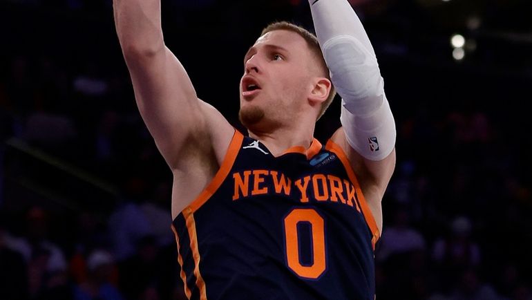 Donte DiVincenzo of the Knicks goes to the hoop against the...