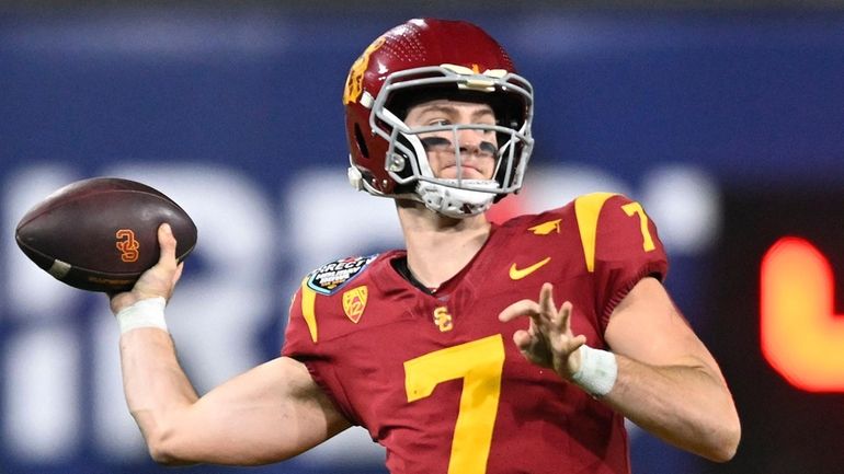 Southern California quarterback Miller Moss throws a pass during the...