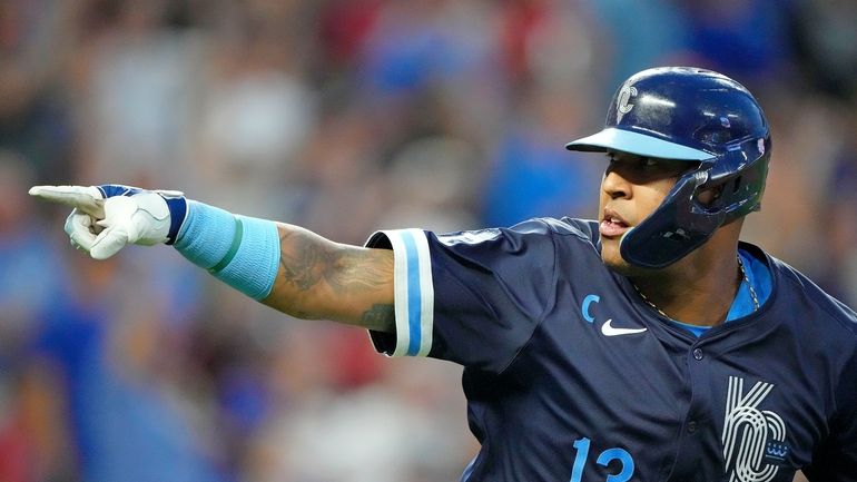 Kansas City Royals' Salvador Perez celebrates after hitting a two-run...