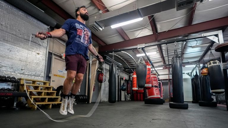 Boxer, MMA fighter and bareknuckle fighter Mike Perry jumps rope...