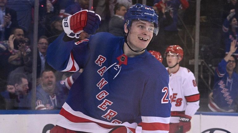 Rangers right wing Kaapo Kakko reacts after he scored against...