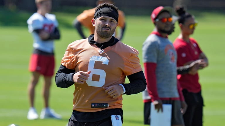 Tampa Bay Buccaneers quarterback Baker Mayfield runs during an NFL...