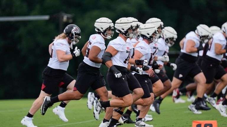 Atlanta Falcons offensive tackle Jake Matthews (70) and the rest...