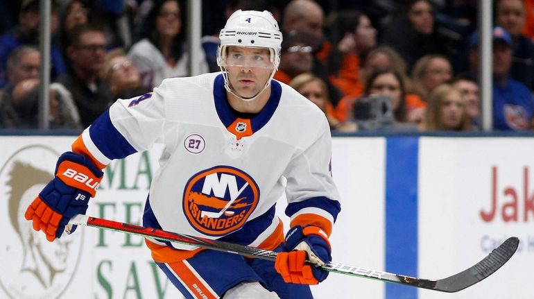 Andy Greene of the Islanders skates during the first period...