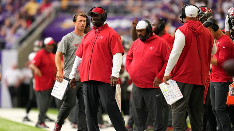 Tampa Bay Buccaneers head coach Todd Bowles watches from the...