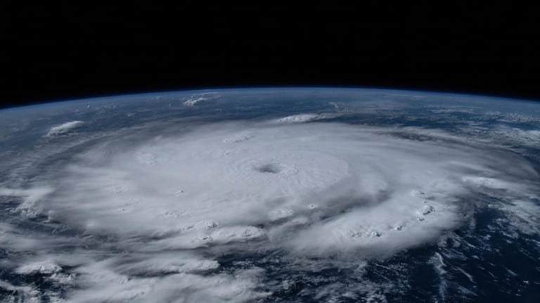 This image provided by NASA shows Hurricane Beryl from the...