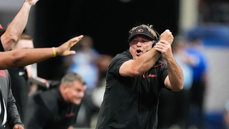 Georgia head coach Kirby Smart reacts during the first half...