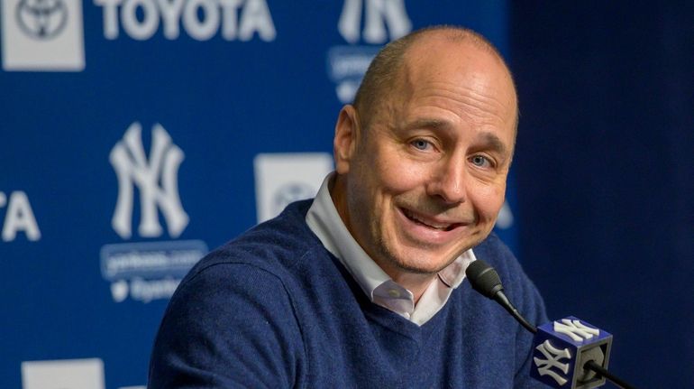 Yankees GM Brian Cashman speaking at a news conference after...