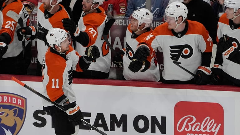 Philadelphia Flyers right wing Travis Konecny (11) celebrates his goal...