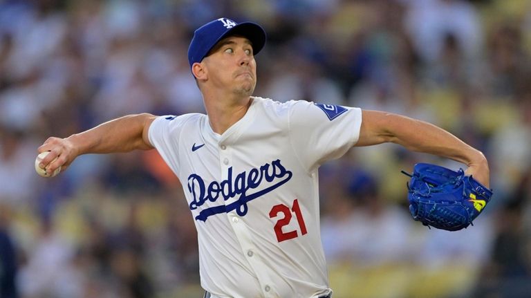 Los Angeles Dodgers' Walker Buehler delivers to the plate during...