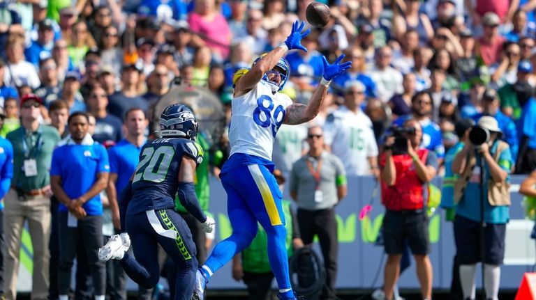 Los Angeles Rams tight end Tyler Higbee catches a pass...