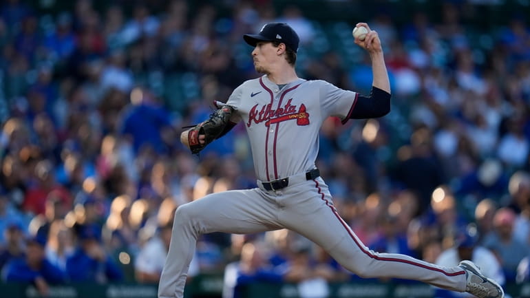 Atlanta Braves starting pitcher Max Fried throws to a Chicago...