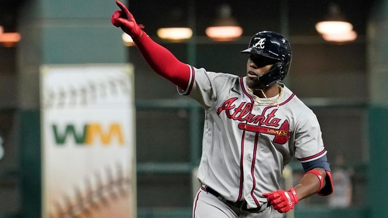 Atlanta Braves' Jorge Soler celebrates a three-run home run during...