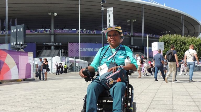 Ndieme Lame, a 57-year-old volunteer for the Paris 2024 Olympic...