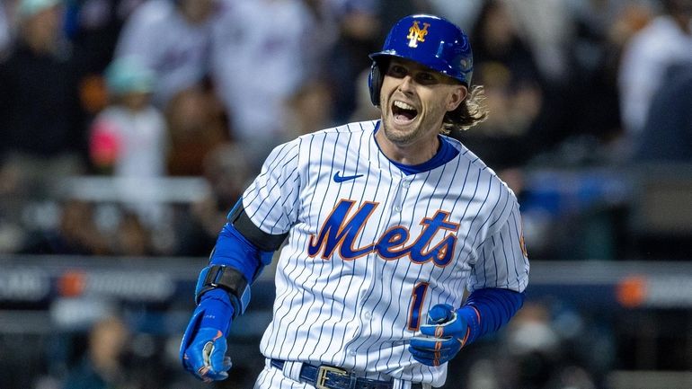 The Mets’ Jeff McNeil reacts in the first inning against the Padres...