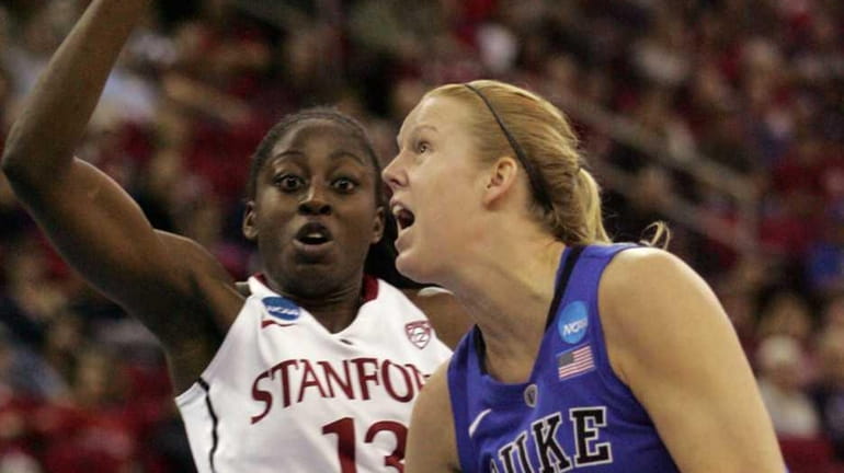 Duke's Kathleen Scheer drives past Stanford's Chiney Ogwumike in the...
