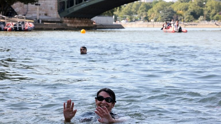 Paris Mayor Anne Hidalgo swims in the Seine river, Wednesday,...