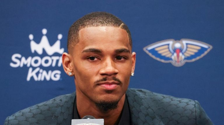 New Orleans Pelicans new player Dejounte Murray speaks during an...