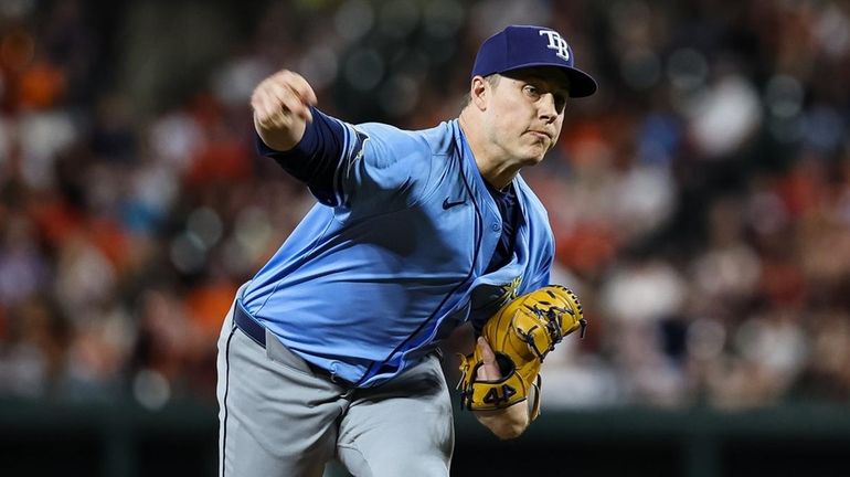 Phil Maton of the Rays pitches against the Orioles during...