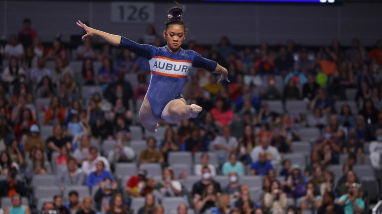 Auburn's Sunisa Lee competes on the balance beam during the...